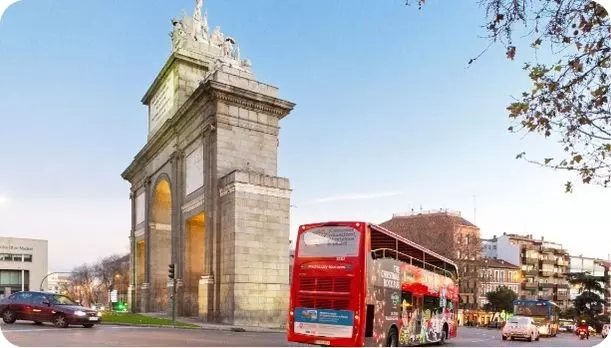 Madrid's hop on hop off bus next to Puerta de Alcalá